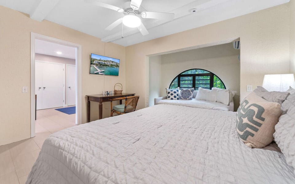 Bedroom 2 with king bed, trundle bed, cold AC, a flat screen TV, and en-suite bath