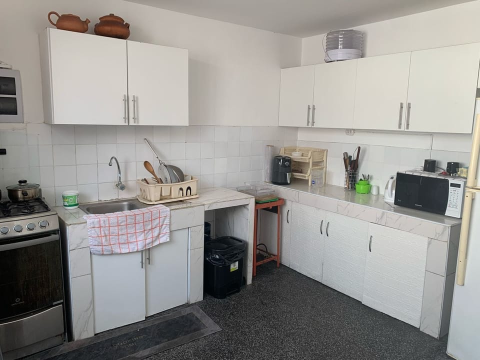 Coffee/tea maker, fridge, microwave, oven