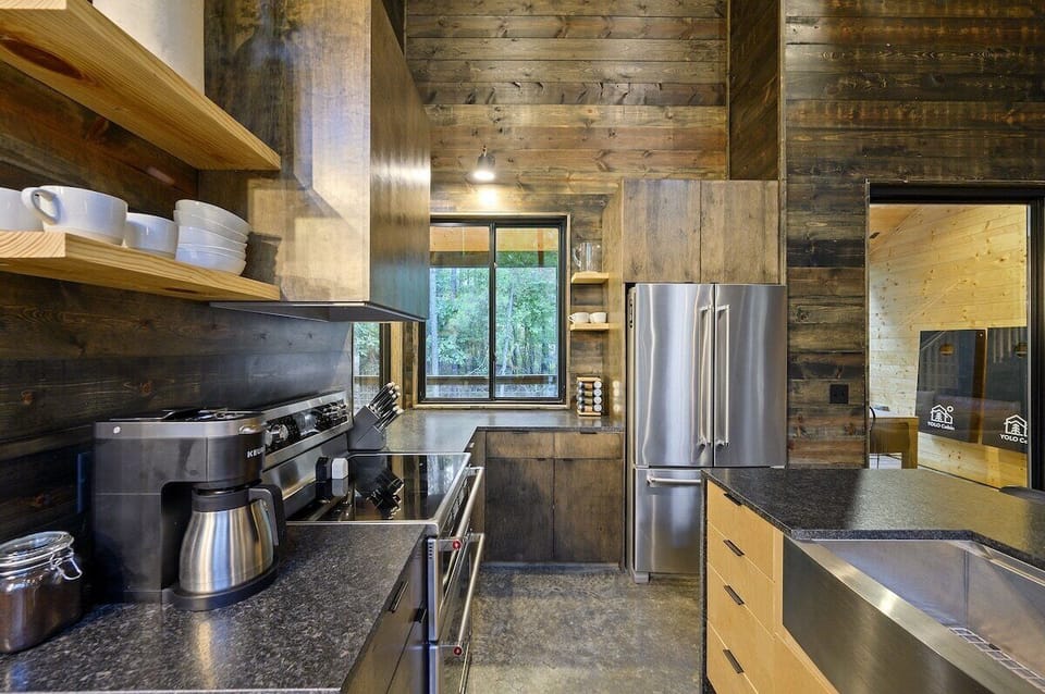 Well stocked kitchen features pass through to patio