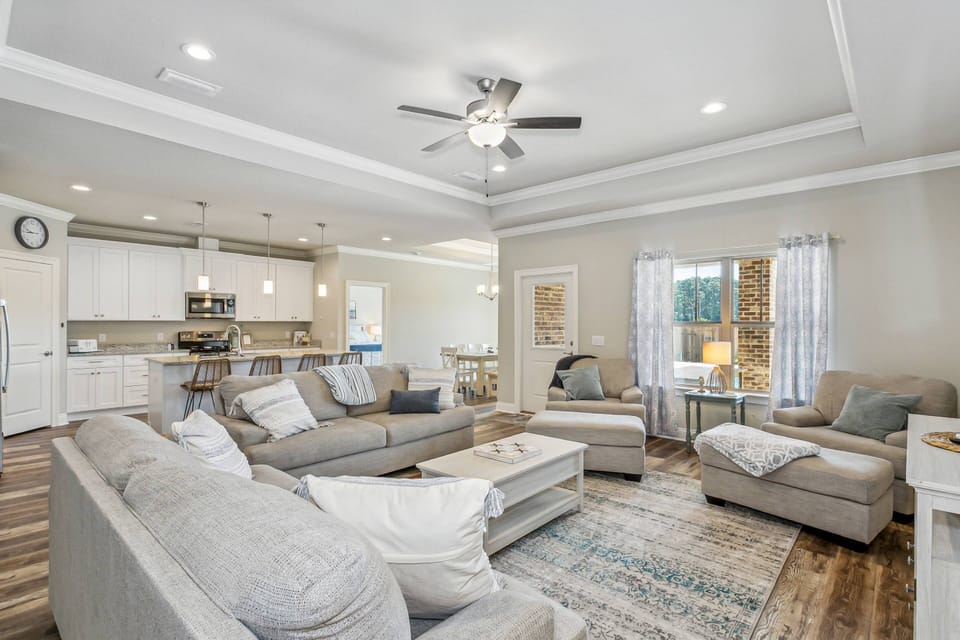 Open concept living room, dining area, and kitchen