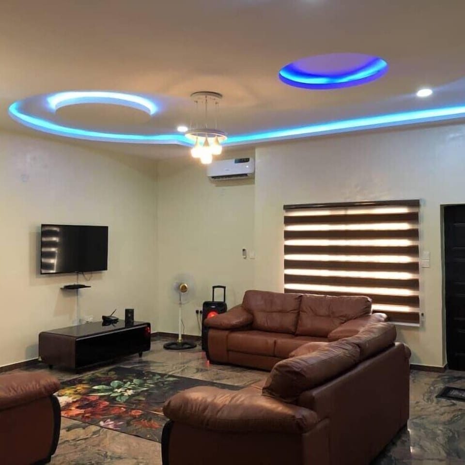 Business Apartment | Living area | 32-inch plasma TV with cable channels