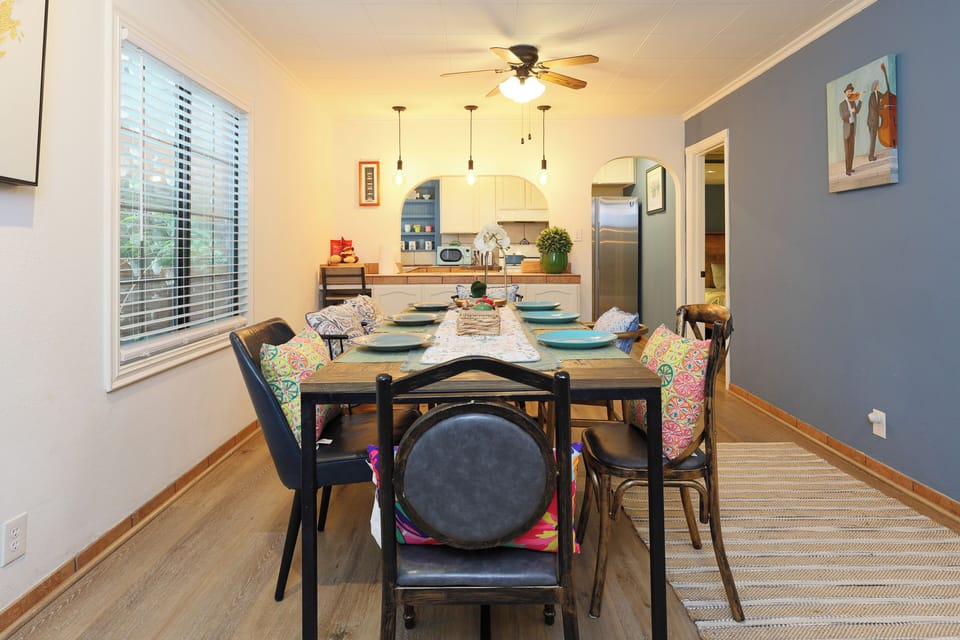 This 6-seater dining area flows into the kitchen for a stylish, cozy space.