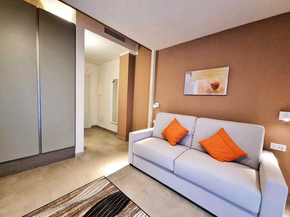 Superior Room | Living area | Flat-screen TV