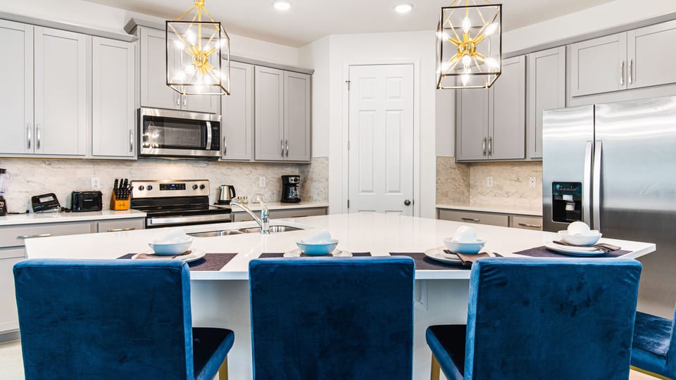 Modern Kitchen with Basic Kitchen Essentials and Bar Stool Seating