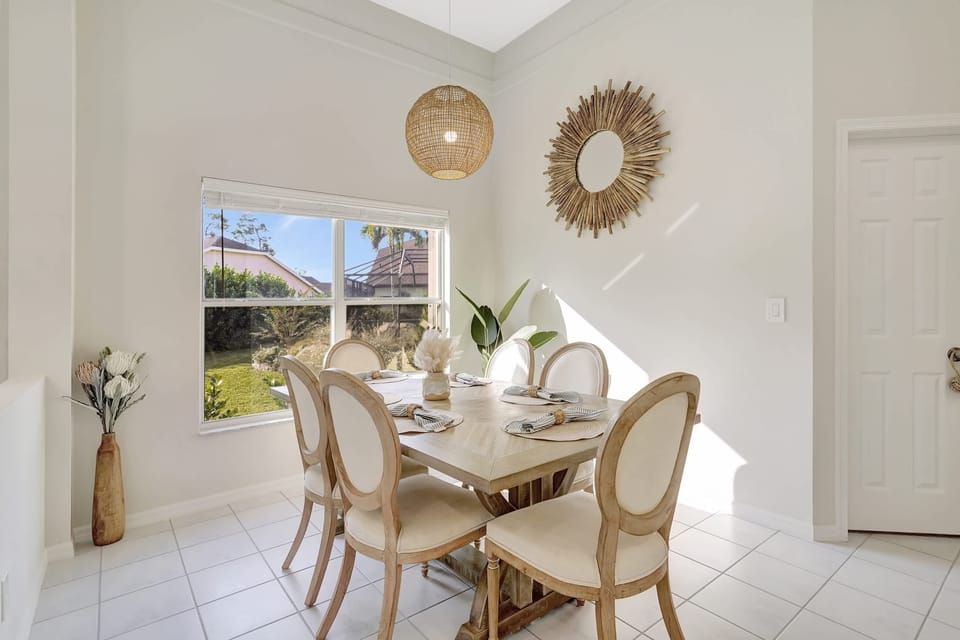Bathed in wonderful natural light, the dining set is a wonderful place to share a meal