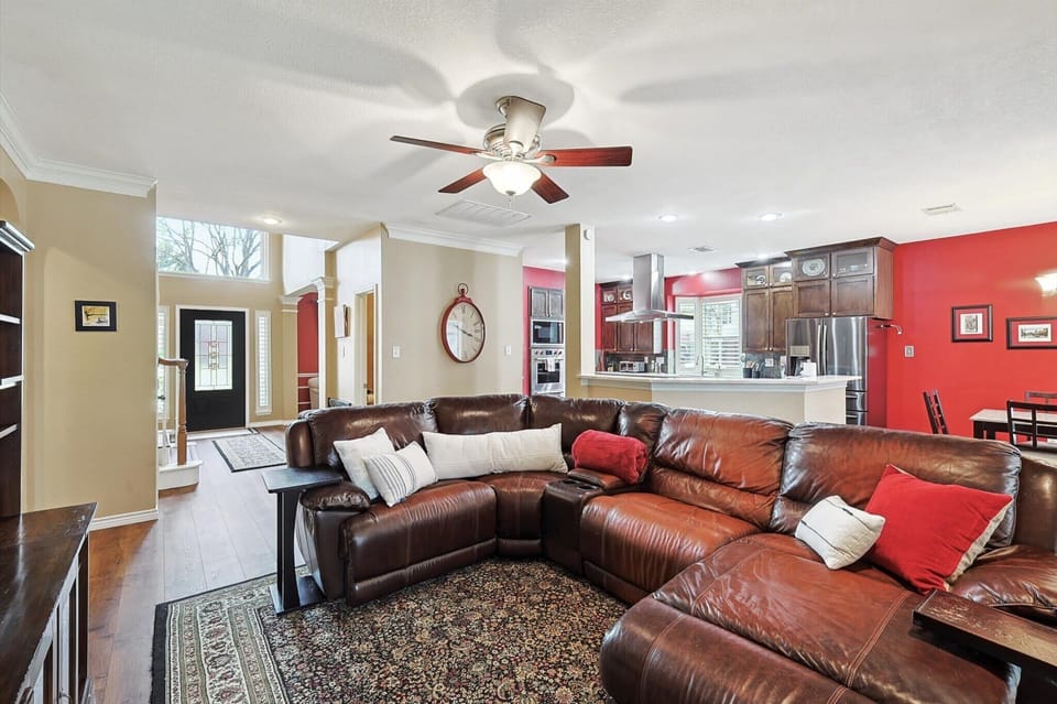 Tastefully furnished with your comfort in mind, this living room offers a homey appeal with plenty of seating for all guests on the oversized sectional.