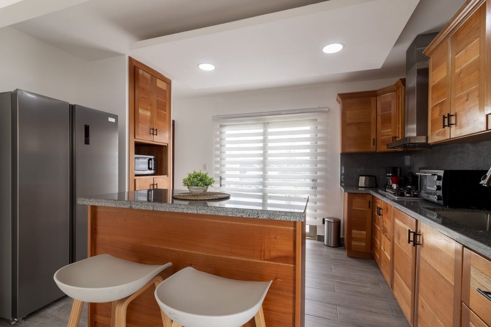 Family Villa | Private kitchen | Full-size fridge, microwave, oven, stovetop