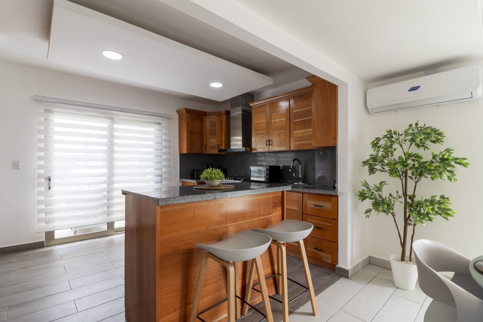 Family Villa | Private kitchen | Full-size fridge, microwave, oven, stovetop