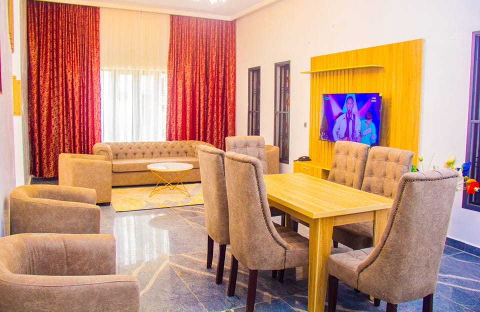 Executive Studio Suite | Living area | 45-inch plasma TV with cable channels
