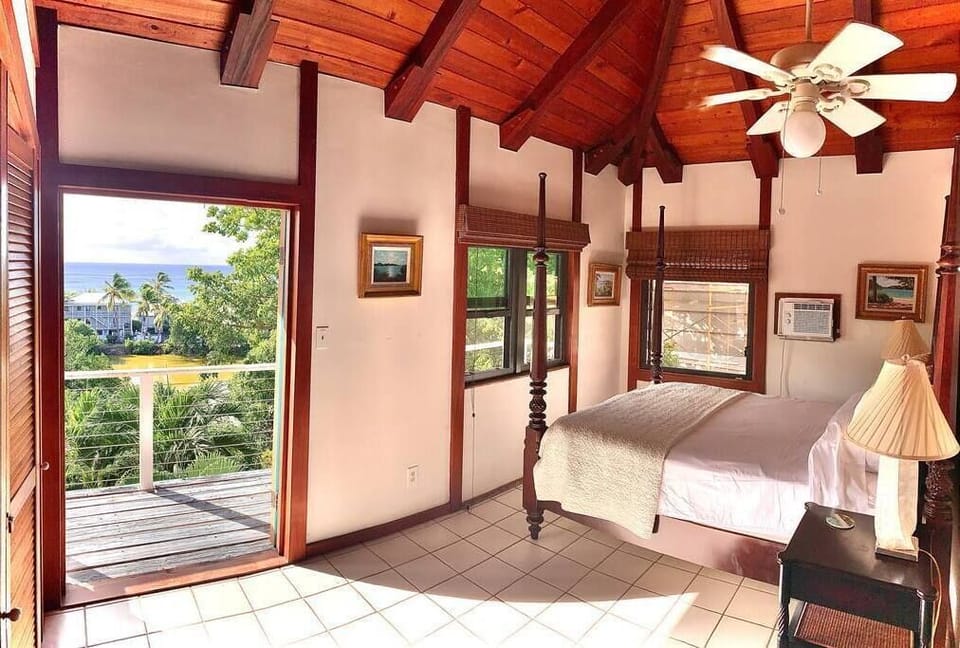 Top story bedroom with Queen Bed and private veranda