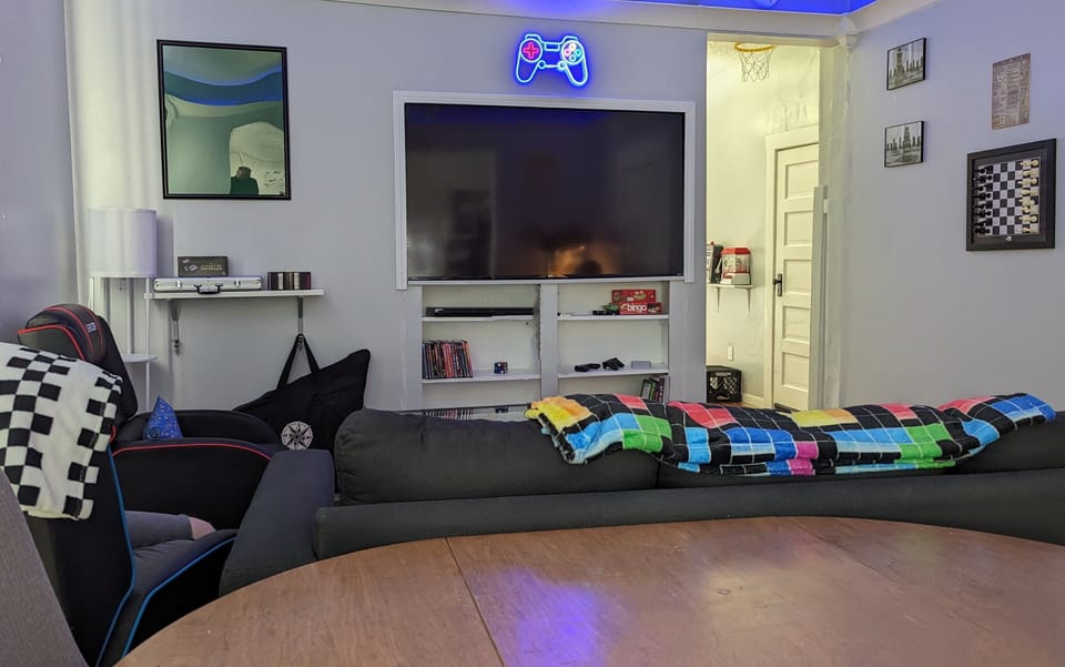 Living room. Tv preloaded with hundreds of games! 