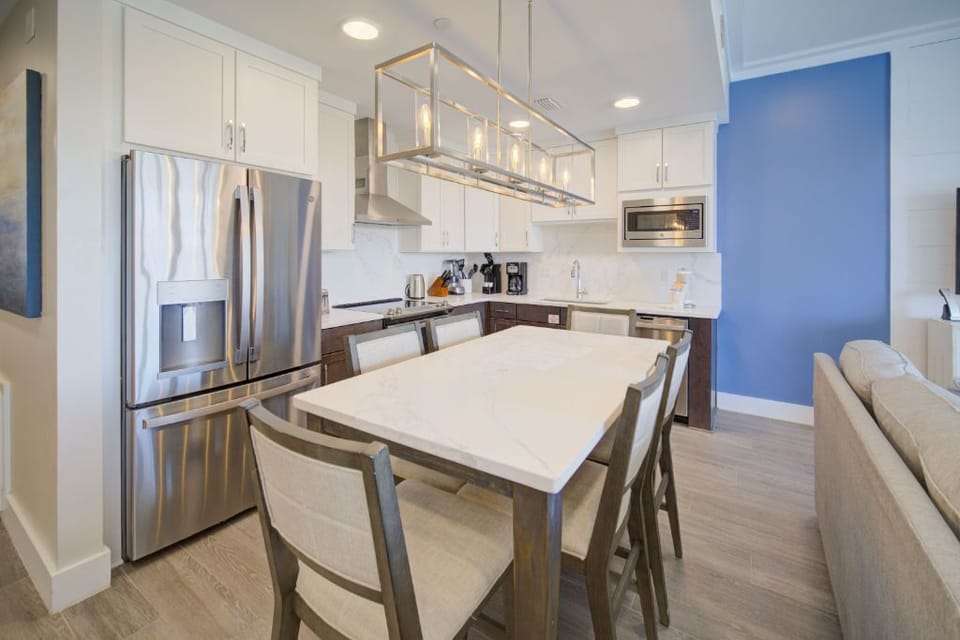 Start your day in a modern, fully-stocked kitchenette, ideal for preparing light meals.