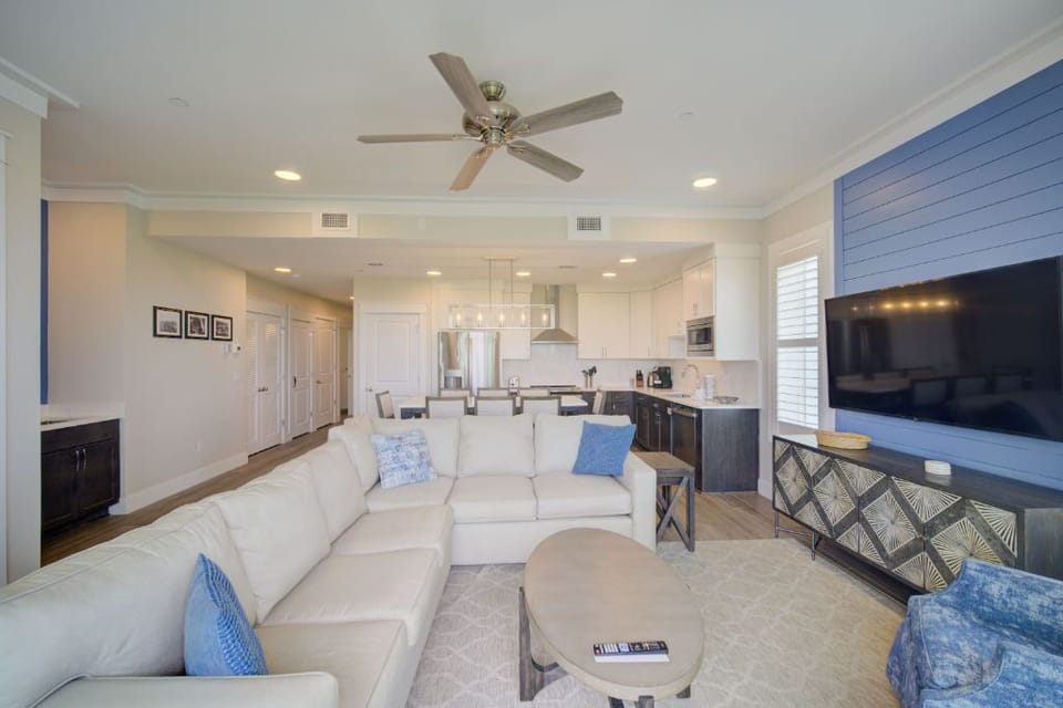 The perfect blend of living and dining, set against a backdrop of calming blues.