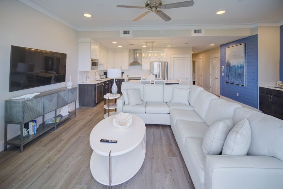 The heart of the home with an open-concept design, combining the kitchen, dining, and living areas.