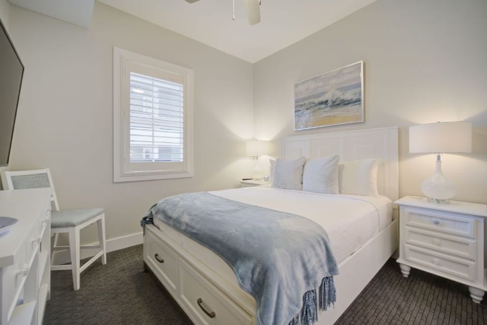 A light-filled bedroom with twin beds, offering a peaceful retreat for rest.