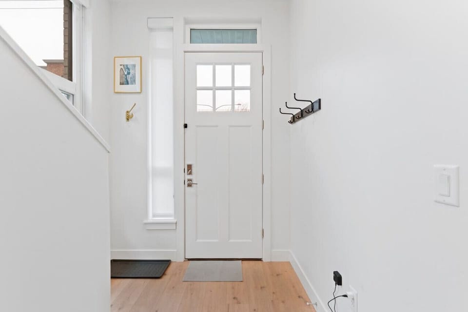 The Front Door entrance. On the ground floor is Bedroom ! with an attached bathroom.