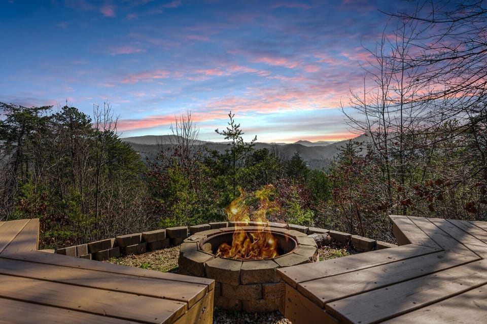Relax and tell stories around the outdoor firepit, overlooking incredible Smoky Mountain vistas.