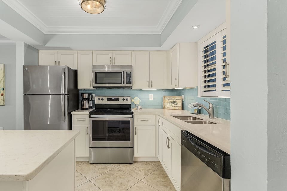 Condo, 2 Bedrooms | Private kitchen | Coffee/tea maker, fridge, oven, toaster