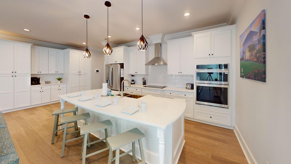 Modern Fully Equipped Kitchen - Sleek, high-end appliances and generous counter space make this kitchen ideal for preparing meals during your stay.