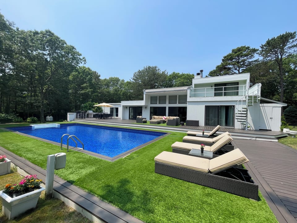 Relax by the Pool with 4-sun padded water-resistant  lounge chairs