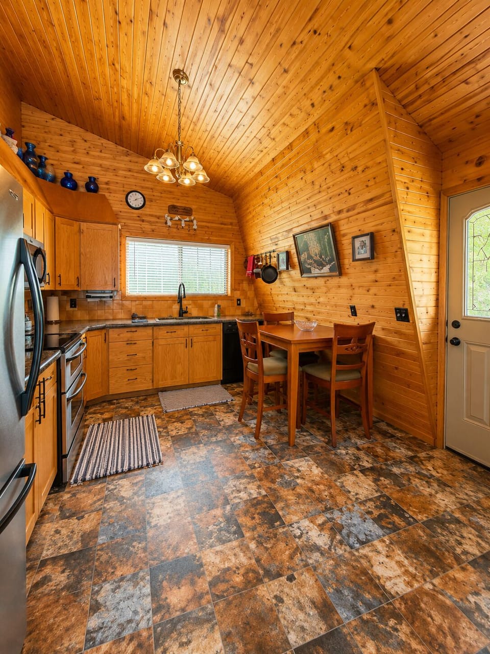 Spacious, fully equipped kitchen with plenty of room for family meals.