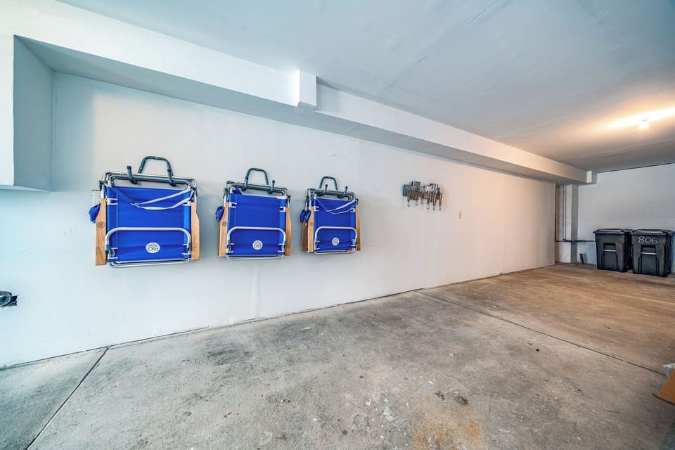 Garage with parking space and beach essentials storage