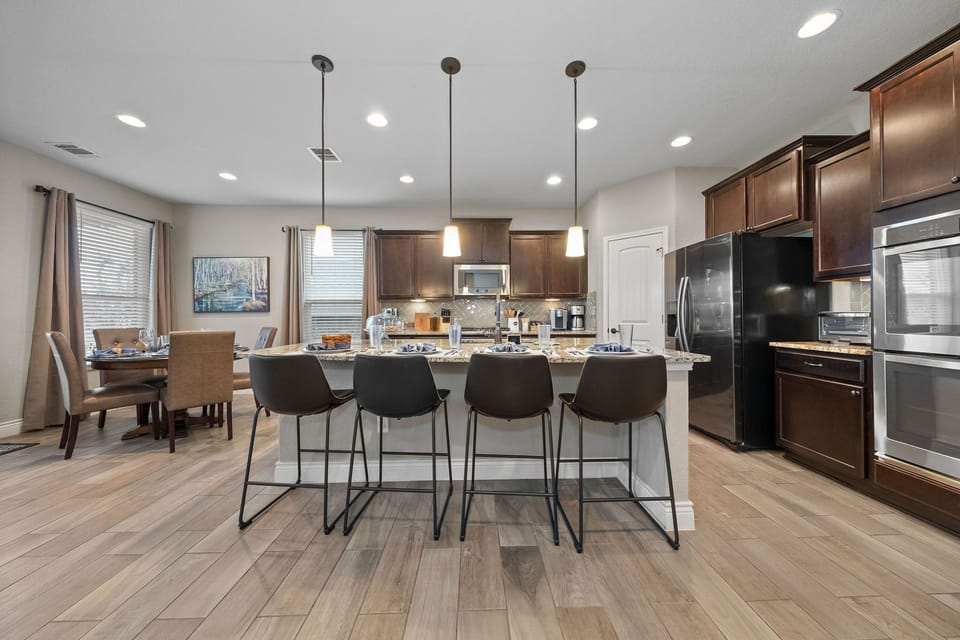 Enjoy time with your family in our Chef's kitchen with gas cooktop & double oven