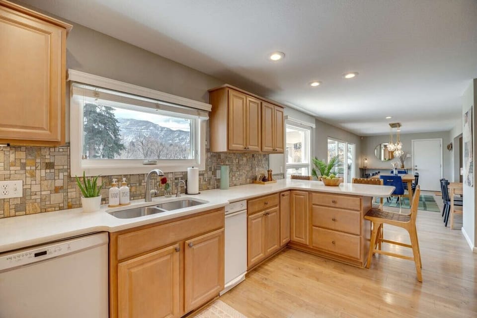 Gorgeous mountain views from this high functioning kitchen with double ovens.