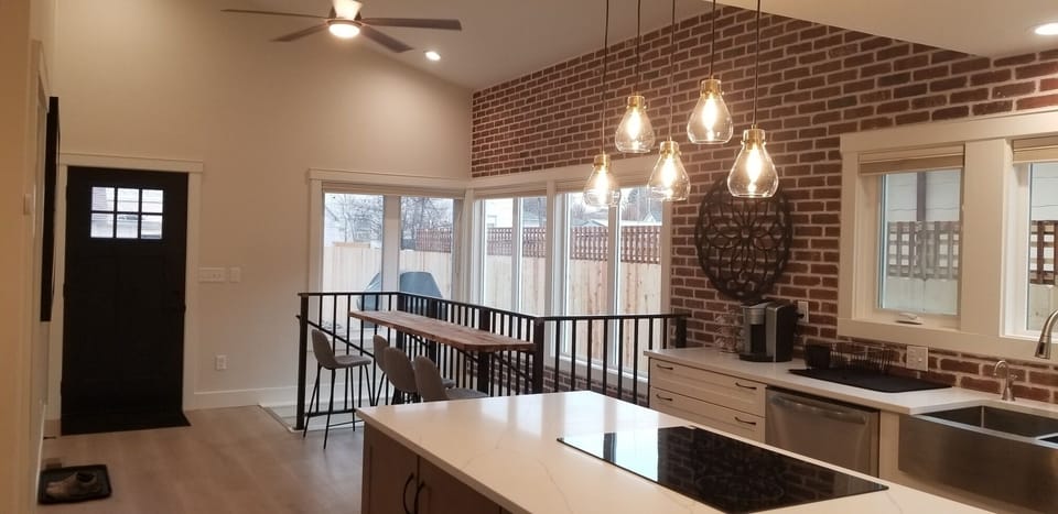 Breakfast bar with fully automatic shades. Privacy fenced side yard.