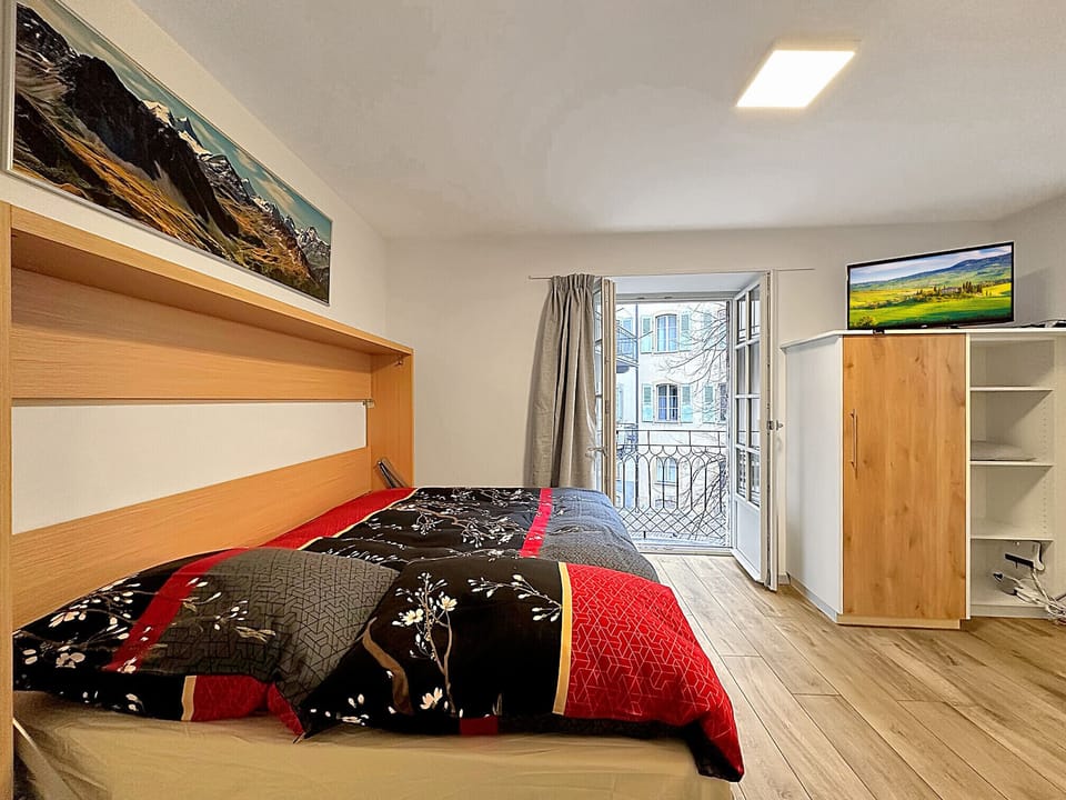View from the comfortable double bed overlooking the studio.