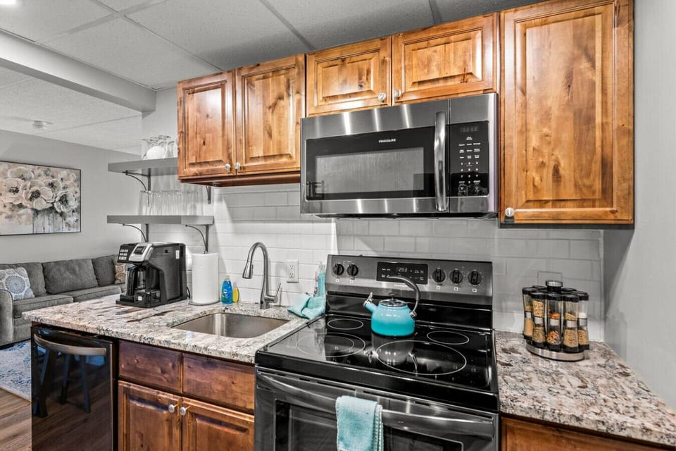 Fully-stocked kitchen loaded with amenities. Stay in and cook a meal together or bring home leftovers from any of the incredible restaurants located just a short walk away.