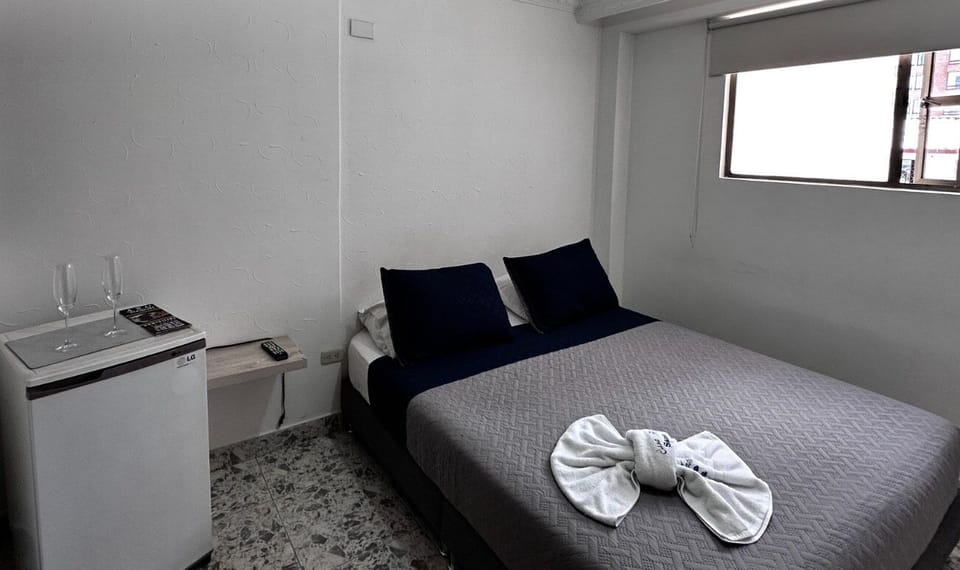 Basic Suite, Private Bathroom | Down comforters, memory foam beds, desk, laptop workspace