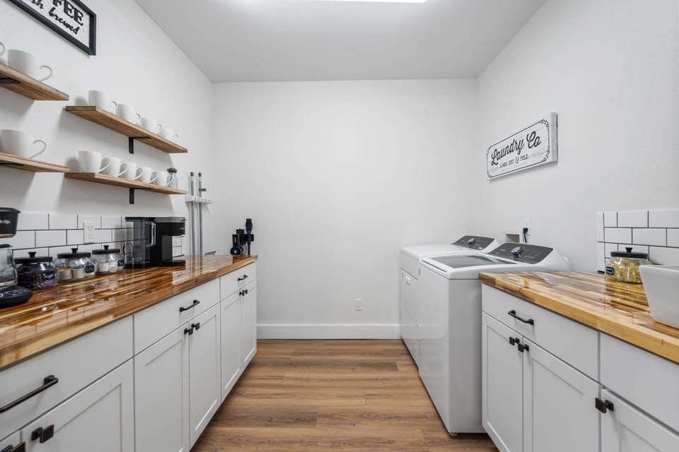Laundry room with coffee bar