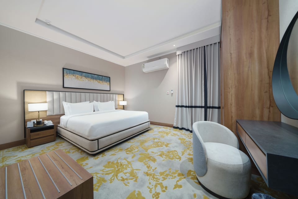 Family Suite | Minibar, in-room safe, desk, laptop workspace