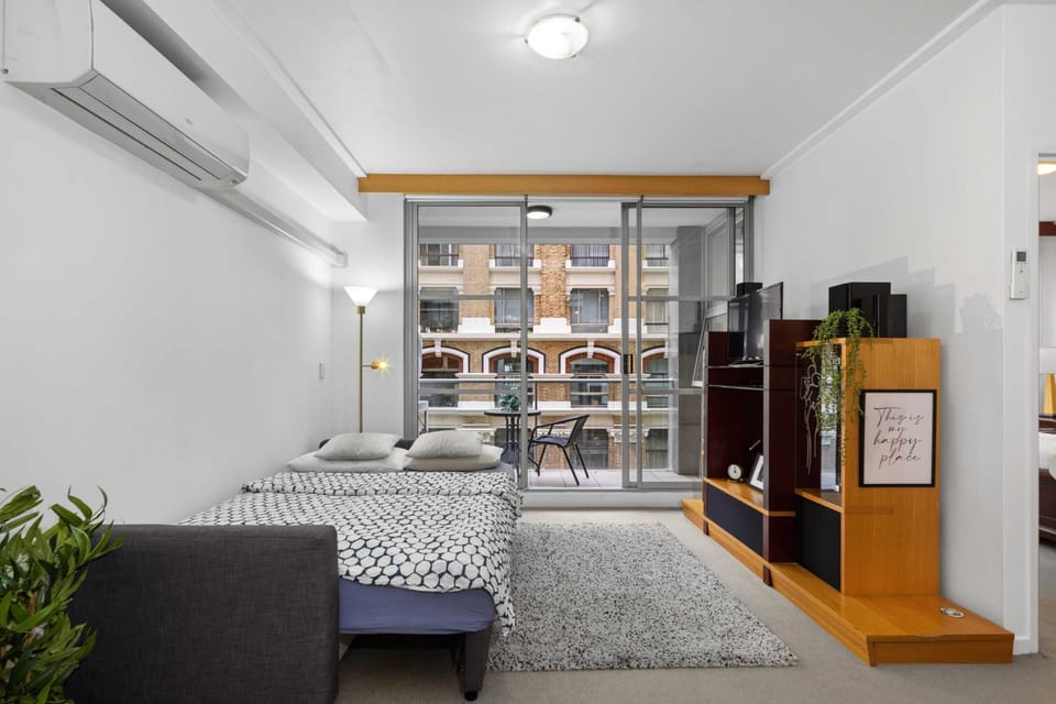 The sofa beds in it's double bed form.