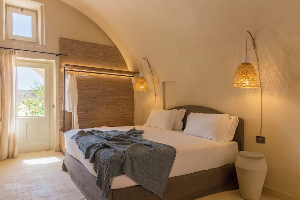 Suite with Patio | Premium bedding, down comforters, minibar, in-room safe