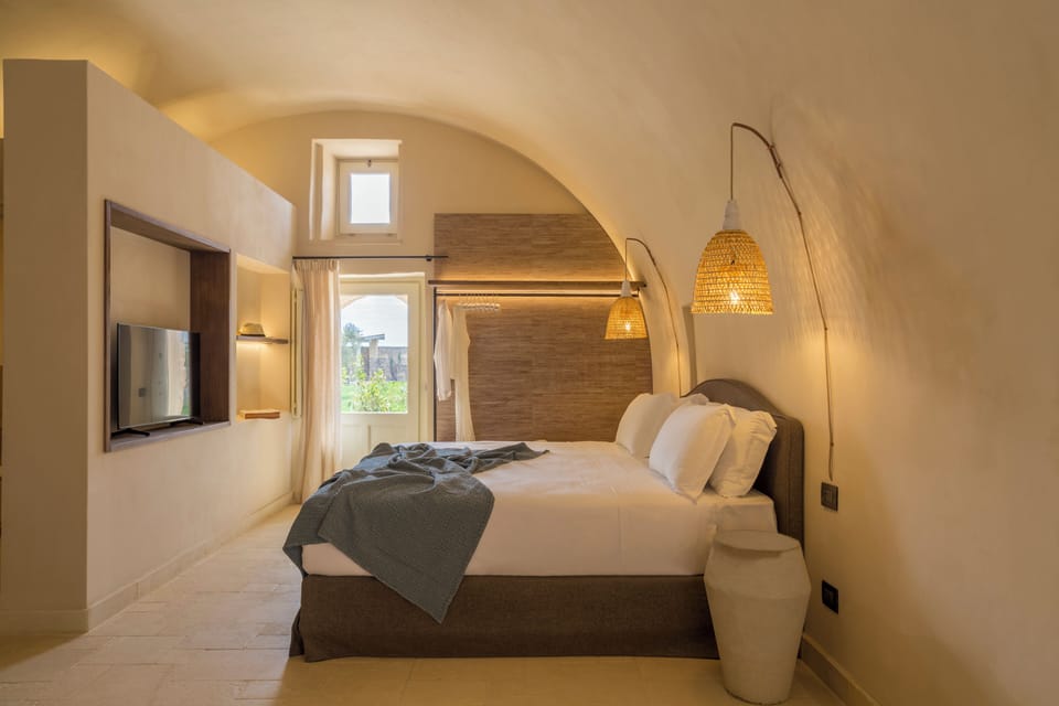 Suite with Patio | Premium bedding, down comforters, minibar, in-room safe