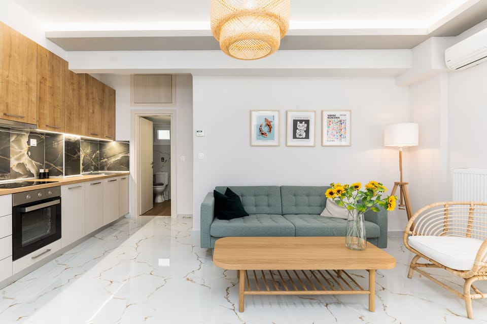 City Apartment | Living area | 40-inch Smart TV with cable channels