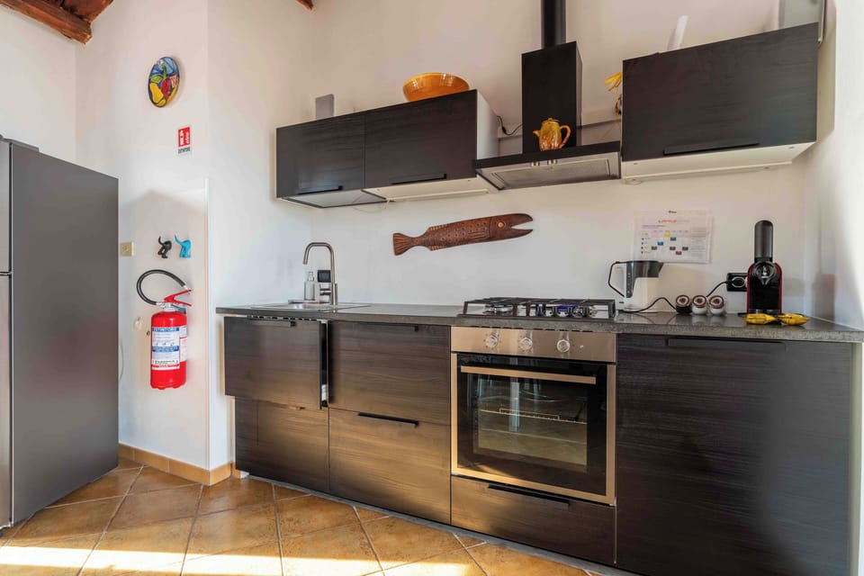 Apartment | Private kitchen | Full-size fridge, oven, stovetop, coffee grinder