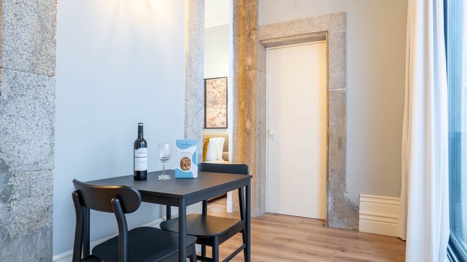 Enjoy intimate meals and heartfelt conversations at this cozy dining table, perfectly sized for two, providing a charming spot to savor local flavors or a homemade breakfast.