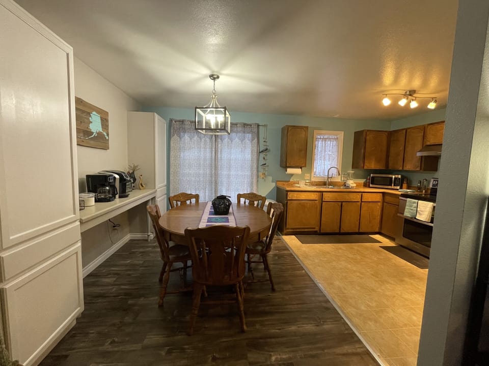 Table for six and sliding door to back yard