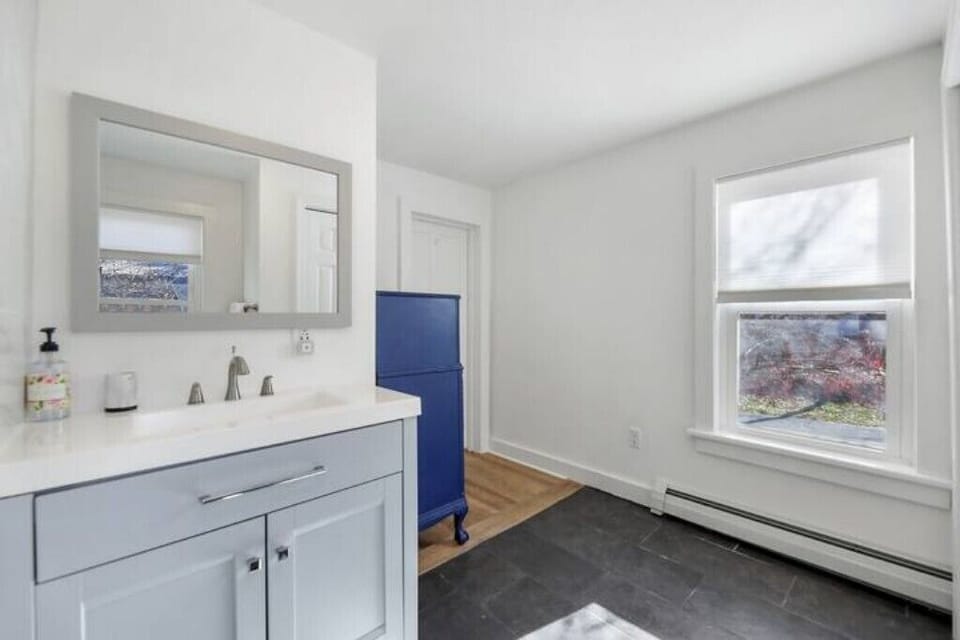 Bathroom 1: Primary full bathroom with walk-in shower. 