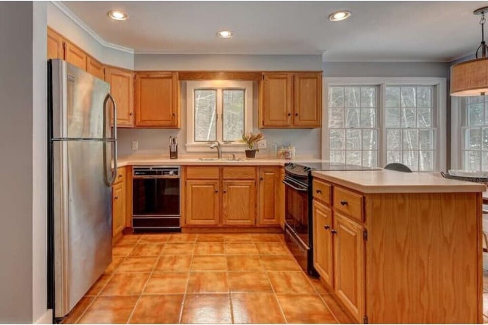 This kitchen is well-appointed to make your favorite meals. Electric stove top