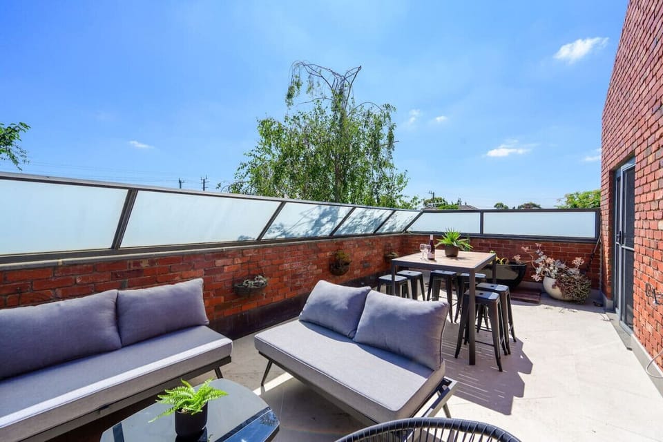 Kick back on the sunny balcony with plenty of seating and space for outdoor meals.