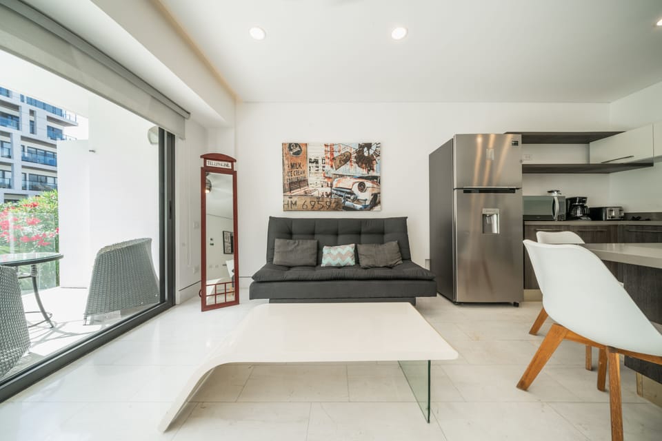 Design Condo | Living area | 43-inch flat-screen TV with digital channels