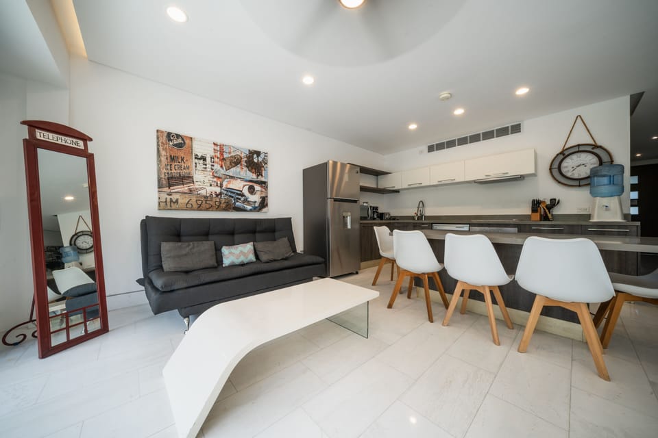 Design Condo | Living area | 43-inch flat-screen TV with digital channels