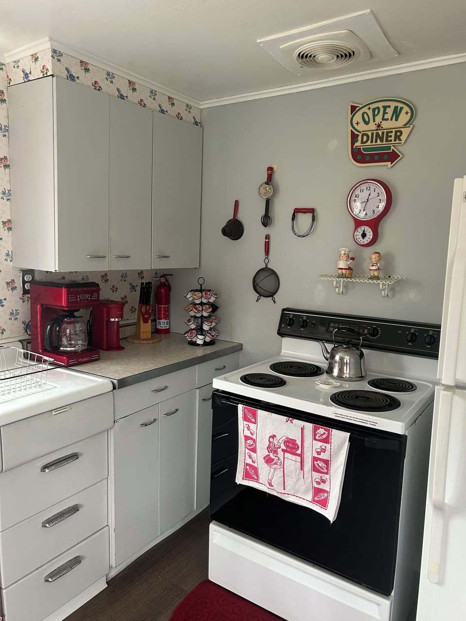 Vintage restored 1950s kitchen with 1950s wall art and decor!