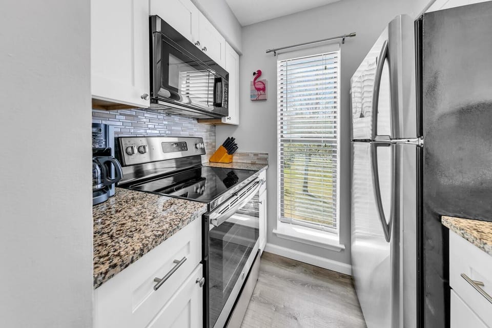 Condo, Multiple Beds (Endless Summer F9) | Private kitchen | Oven, toaster