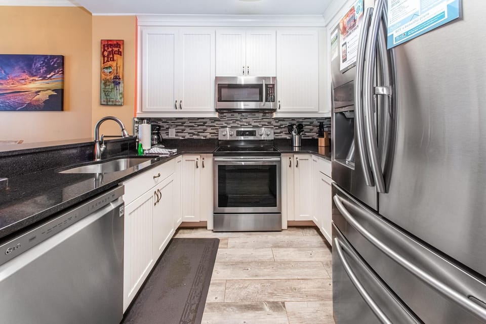 Condo, Multiple Beds (Calypso 2-2304 West) | Private kitchen | Oven, toaster