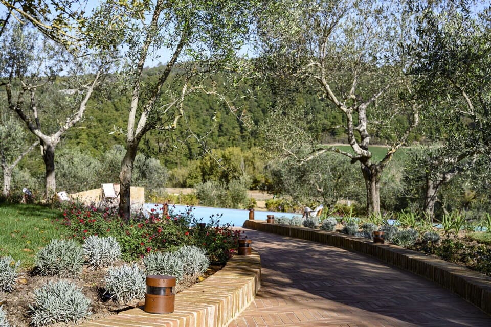 Activities, Amenities, Building Exterior, Garden, Main Entrance, Pool, Spring, Summer, Wellness